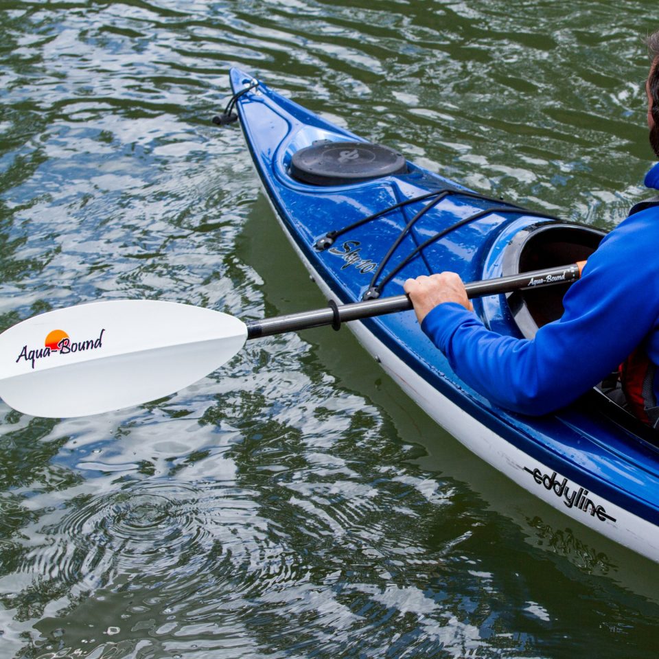 Manta Ray Hybrid paddle being used on a kayak