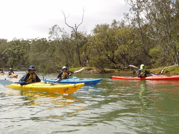 Kayakers paddling the Australis Salamander